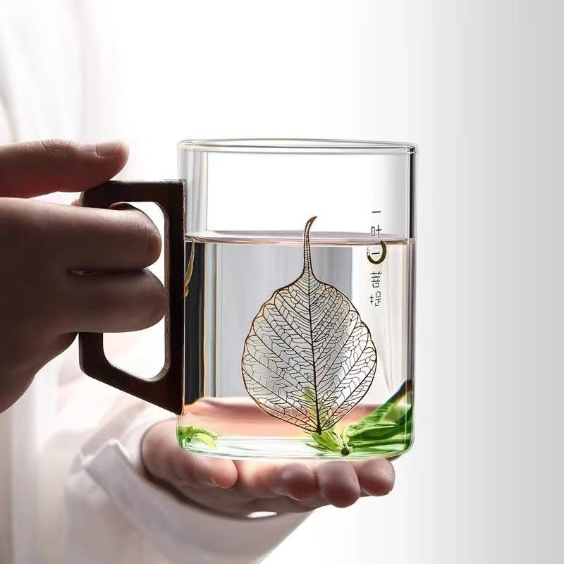 Tea cup with walnut handle